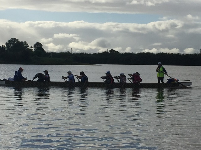 The Dragon boat crew out for early morning practice.