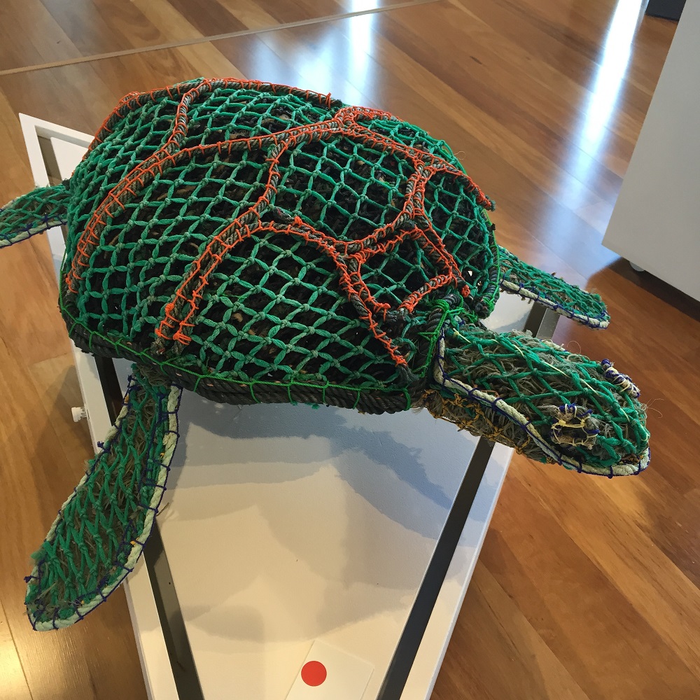 Turtle fashioned from the deadly ghost nets that kill them. Displayed in the Art Centre.