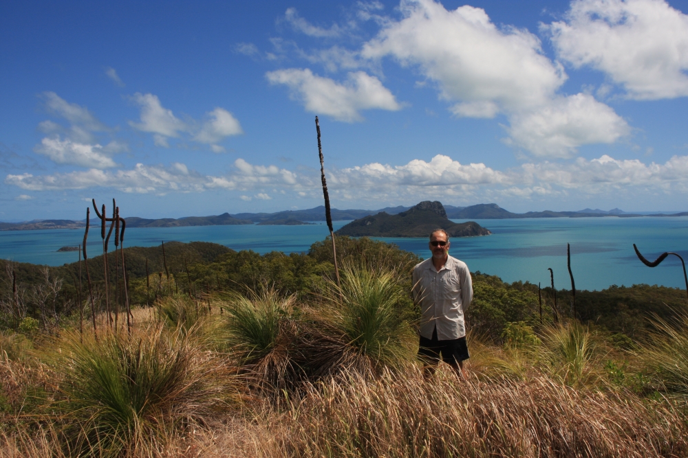 Steve on top of Mt Oldfield on Lindeman Island, with Pentecost Island just behind him.