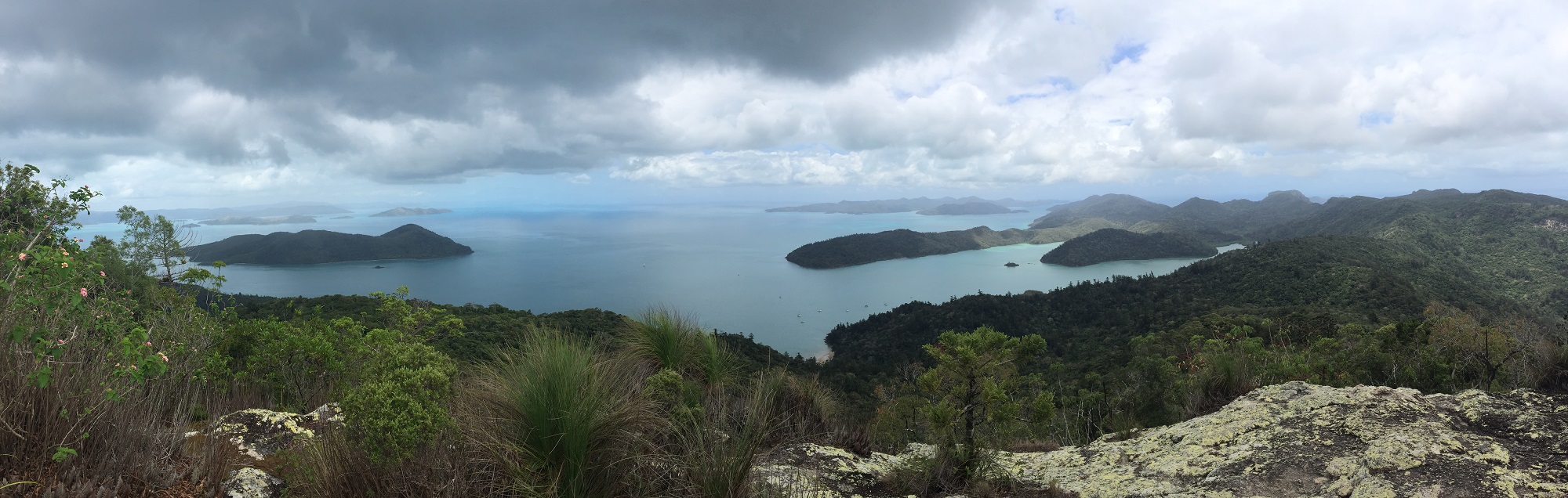 The view north from Whitsunday Peak. Cid Island on the left, Cid Harbour the protected area between the island and the headland jutting out from the right.