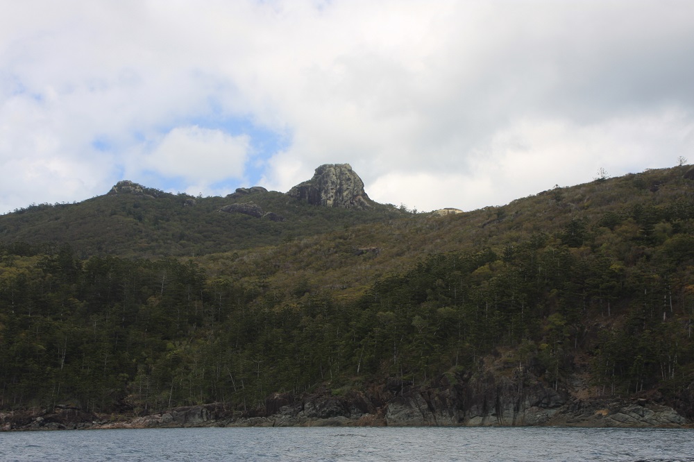 East coast of Whitsunday Island. These eastern shores are quite foreboding with their steep rocky cliffs - not a place a little trailer sailer is happy. We didn't enjoy our sailing on the eastern side of the islands - the ocean is much rougher out here too.