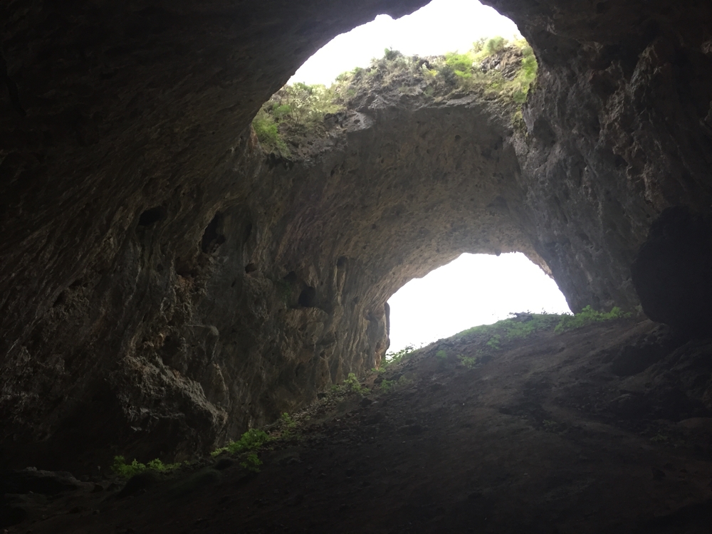Cave entrance and a collapsed section of the roof.