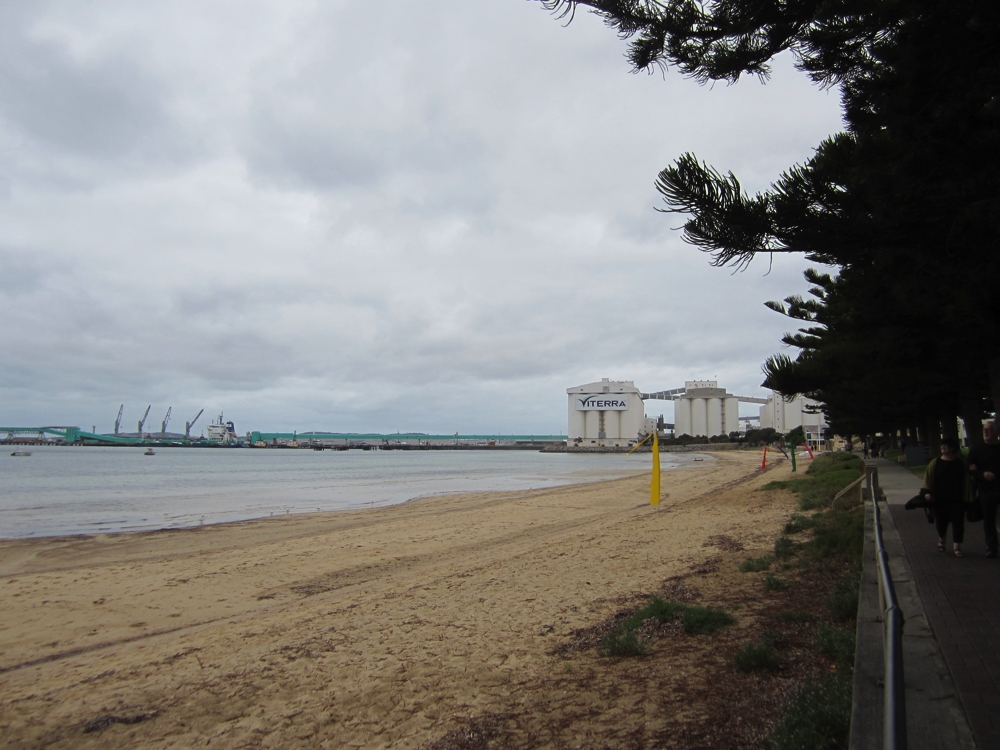 The silos and port for the wheat industry. Note the conveyor belt that takes the grain out for bulk-loading onto the ships. Photo taken from near the townsite, Port Lincoln.