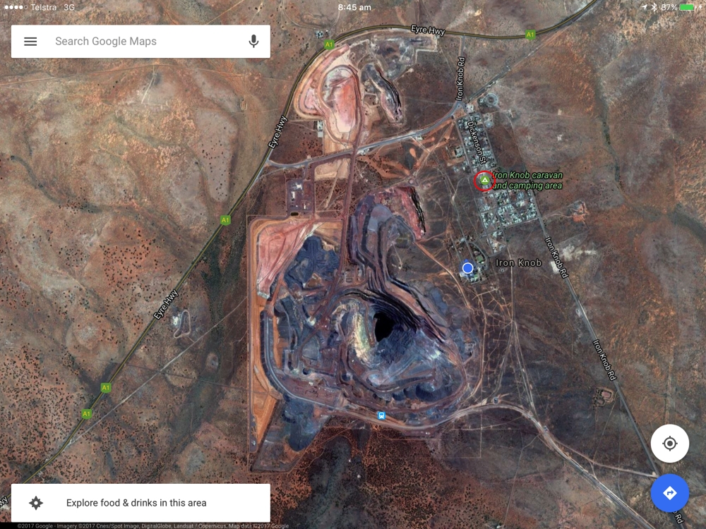 This Google Earth view of Iron Know will give you an idea of the size of the mine, with the tiny town beside it. The red circle is where we camped the night.