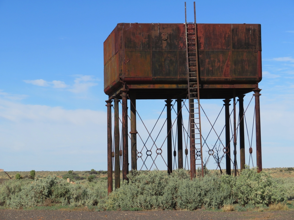 The water tower at Farina railway siding. This style of cast iron tank is common at the Ghan sidings - the water being used to refill the steam engines.