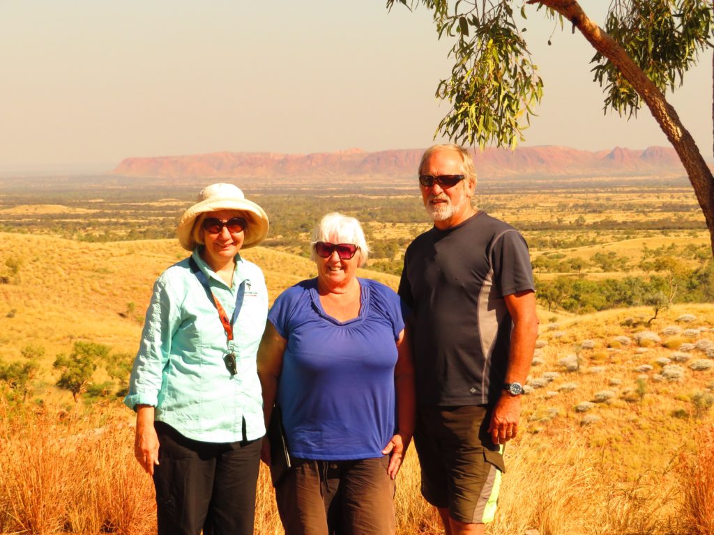 Posing at Tylers Pass with Gosses Bluff in the background. Denise, Wendy, Ken.